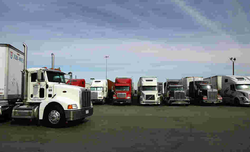 A truck stop near Hesperia, Calif. To address a shortage of truck drivers resulting from a mismatch of skills in the labor market, some trucking companies have started free driving schools with the promise of a job upon completion.