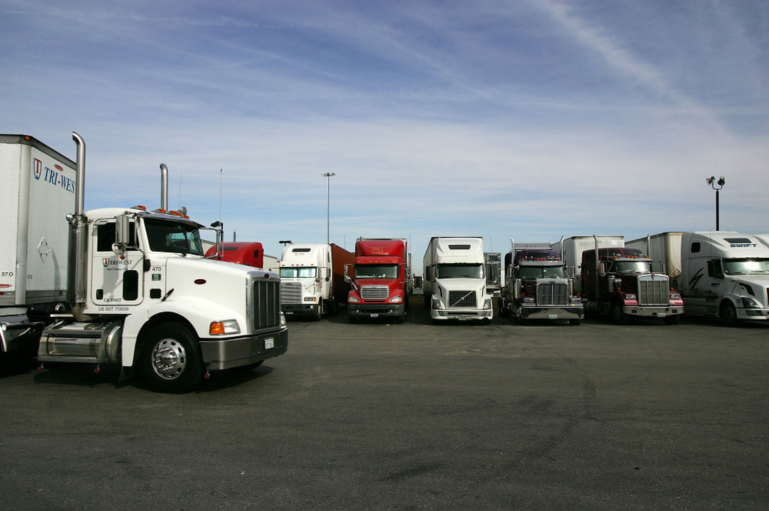 A truck stop near Hesperia, Calif. To address a shortage of truck drivers resulting from a mismatch of skills in the labor market, some trucking companies have started free driving schools with the promise of a job upon completion.