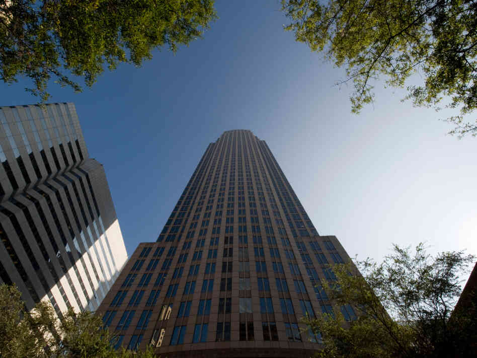 Bank of America's headquarters towers over the city center in Charlotte, N.C. Charlotte has long been one of the fastest-growing regions in the country, but now nearly one in 10 residents is out of work. Bank of America's headquarters towers over the city center in Charlotte, N.C. Charlotte has long been one of the fastest-growing regions in the country, but now nearly one in 10 residents is out of work.