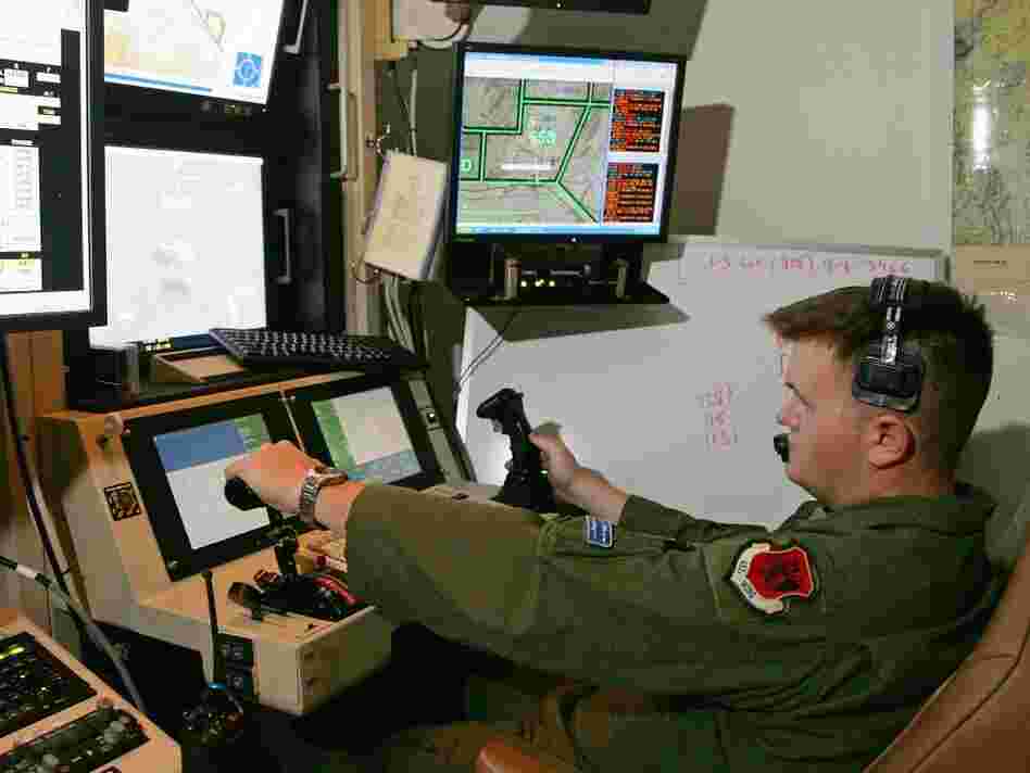 Some of the computers controlling America's fleet of drone aircraft are reportedly infected by a persistent virus. In this file photo, a senior airman remotely operates an MQ-9 Reaper during a training mission at Creech Air Force Base in Indian Springs, Nev.