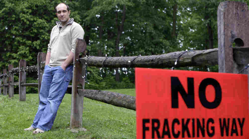 T.J. Turner stands in his yard in Yellow Springs, Ohio, on May 27 near a sign protesting the practice of fracking, a process used to extract oil or natural gas from hard rock formations. Turner was approached by a salesman for an energy exploration company to lease rights for drilling on his property. T.J. Turner stands in his yard in Yellow Springs, Ohio, on May 27 near a sign protesting the practice of fracking, a process used to extract oil or natural gas from hard rock formations. Turner was approached by a salesman for an energy exploration company to lease rights for drilling on his property.