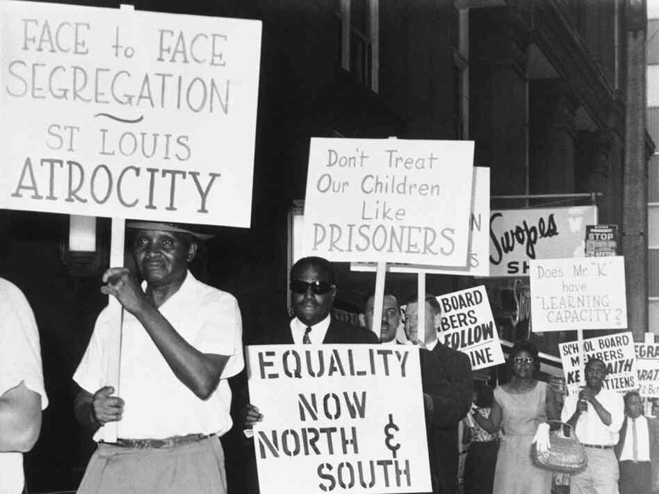 Civil rights groups picketed a meeting of the board of education in downtown St. Louis in June 1963 to protest integration policies in public schools. Civil rights groups picketed a meeting of the board of education in downtown St. Louis in June 1963 to protest integration policies in public schools.