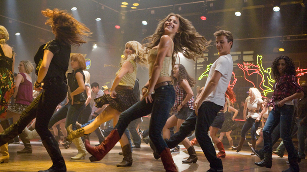 Kickin' It, New School: Julianne Hough (center) and Kenny Wormald (right) anchor the Footloose remake — which stands up pretty well to the original.
