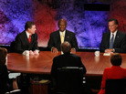 HANOVER, NH - OCTOBER 11: (L-R) Jon Huntsman, U.S. Rep. Michele Bachmann (R-MN), Texas Gov. Rick Perry, Herman Cain and Mitt Romney laugh during the Republican Presidential debate hosted by Bloomberg and the Washington Post on October 11, 2011 at Dartmouth College in Hanover, New Hampshire. 