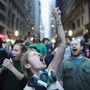 Demonstrators associated with the Occupy Wall Street movement face off with police Friday in the streets of New York City's financial district. Demonstrators associated with the Occupy Wall Street movement face off with police Friday in the streets of New York City's financial district.