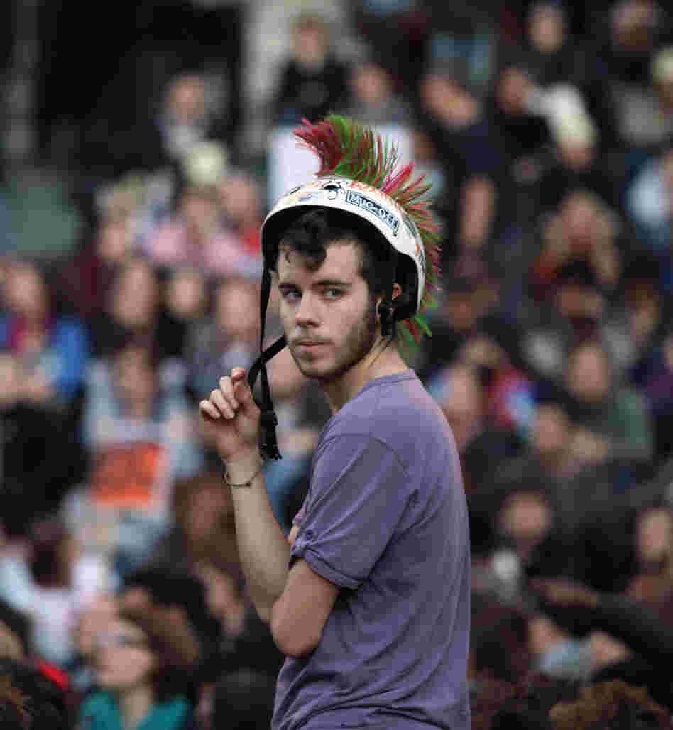 A protester stands outside St Paul's Cathedral in London. 