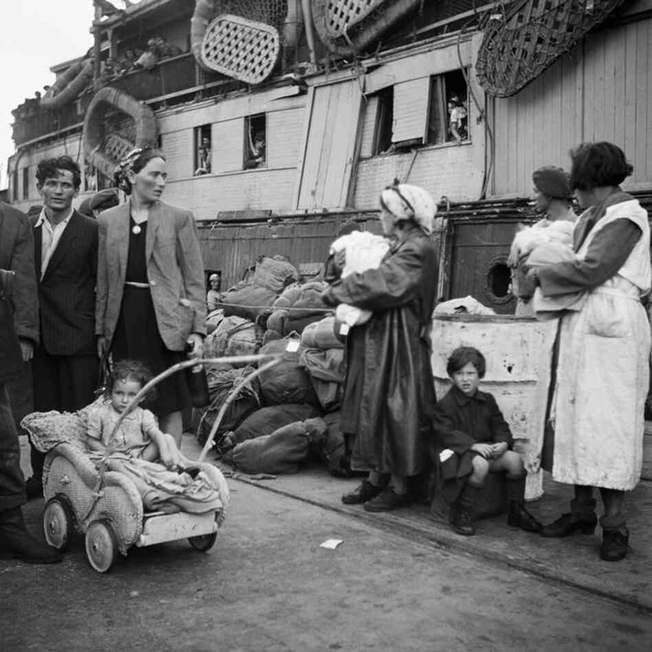 Refugee families awaiting forced deportation and transfer to prison ships at Haifa Port, July 18, 1947