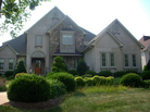 Realtor Lee Brown says Charlotte, N.C., has a whole community of "starter castles" that were built during the housing boom. One foreclosed home is expected to go for about half the value it had in 2007. Realtor Lee Brown says Charlotte, N.C., has a whole community of "starter castles" that were built during the housing boom. One foreclosed home is expected to go for about half the value it had in 2007.