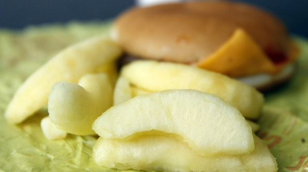 McDonald's says it introduced Happy Meals with apple slices to "help customers make nutrition-minded choices for their daily lifestyles."