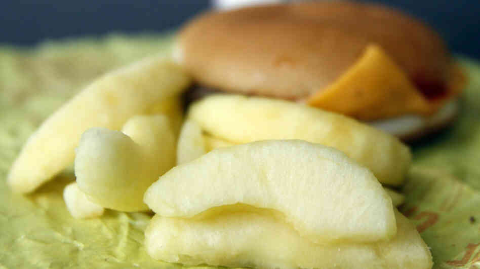 McDonald's says it introduced Happy Meals with apple slices to "help customers make nutrition-minded choices for their daily lifestyles."