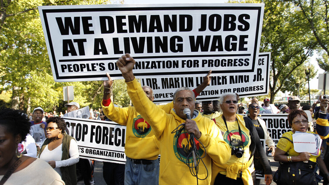 Demonstrators demand easier access to jobs as they march in Washington, D.C., on Saturday.
