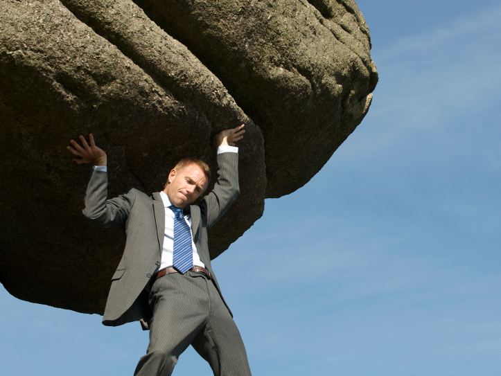 <p>Man lifting rock.</p>