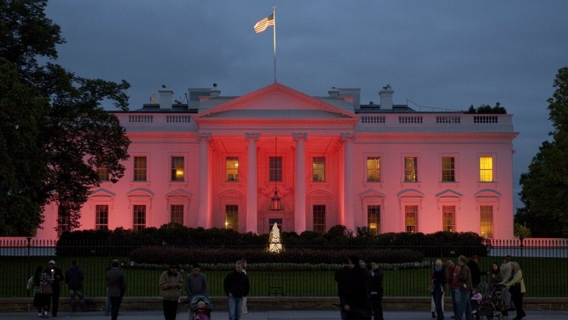 Pink lights illuminate the north side of the White House to commemorate Breast Cancer Awareness Month. 
