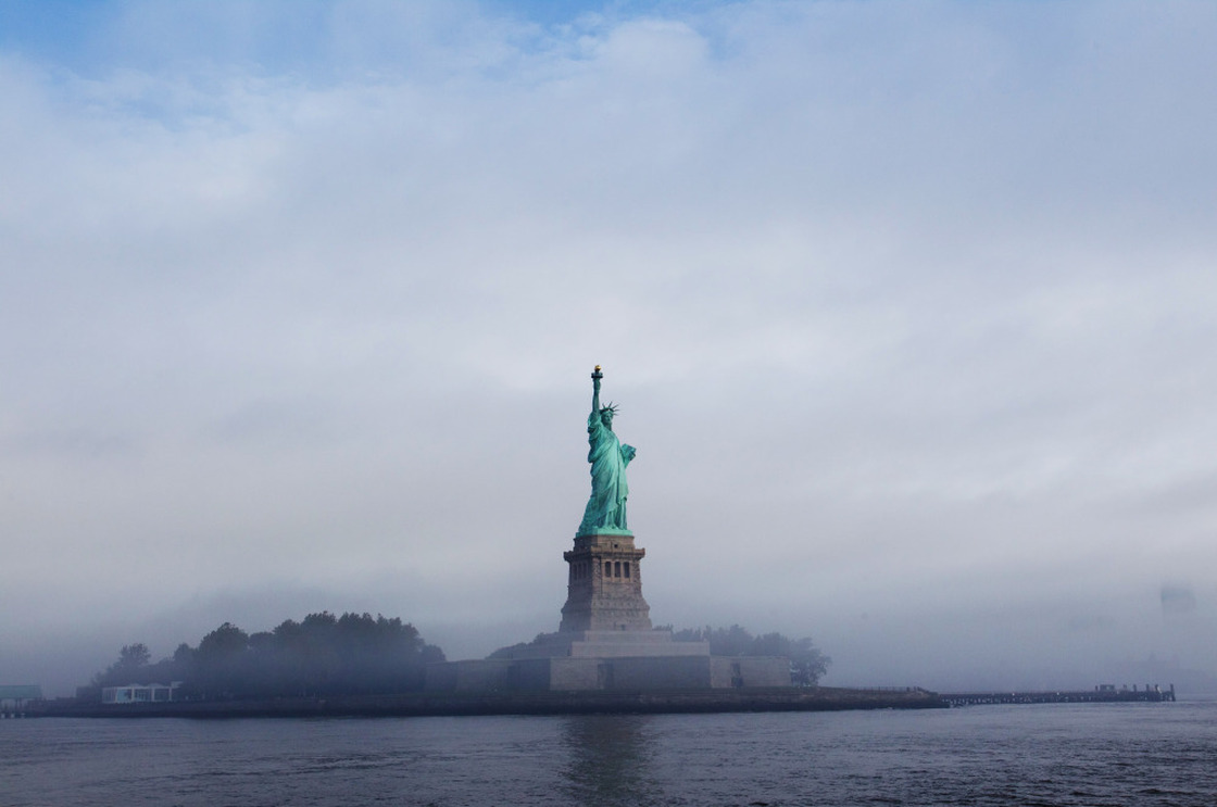 The Statue of Liberty is seen through fog prior to the start of the 125th Anniversary of the Statue of Liberty ceremony on Liberty Island in Sept. 2011. 