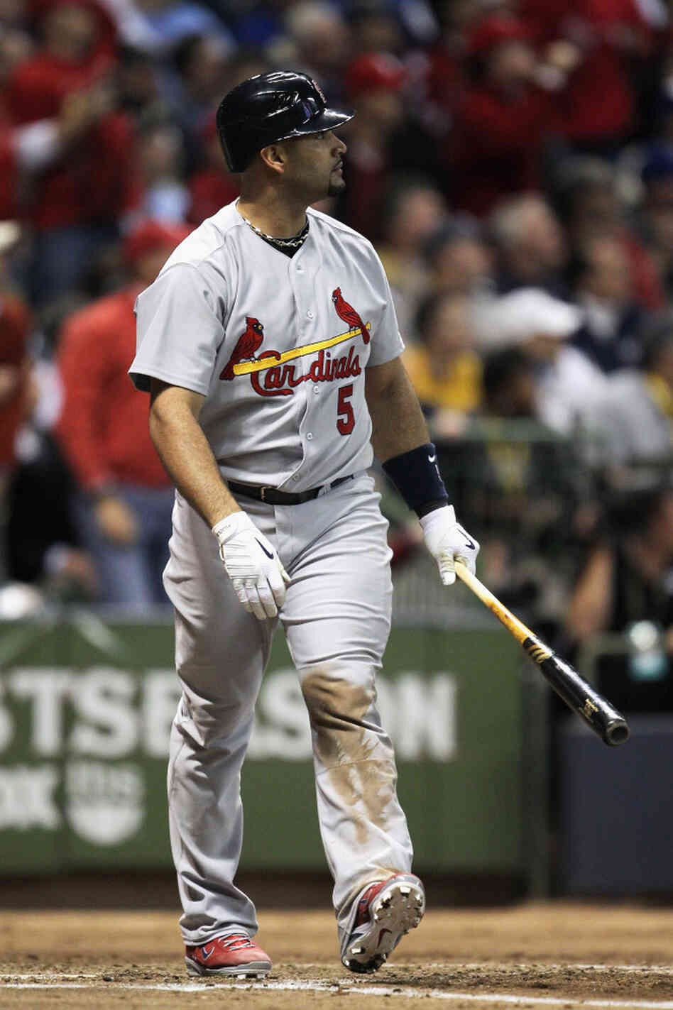 Albert Pujols of the St. Louis Cardinals watches his solo home run in the top of the third inning against the Milwaukee Brewers during Game 6 of the National League Championship Series. Albert Pujols of the St. Louis Cardinals watches his solo home run in the top of the third inning against the Milwaukee Brewers during Game 6 of the National League Championship Series.