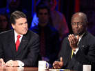 Herman Cain (right) speaks as Texas Gov. Rick Perry looks on during a GOP presidential debate at Dartmouth College on Oct. 11. Herman Cain (right) speaks as Texas Gov. Rick Perry looks on during a GOP presidential debate at Dartmouth College on Oct. 11.