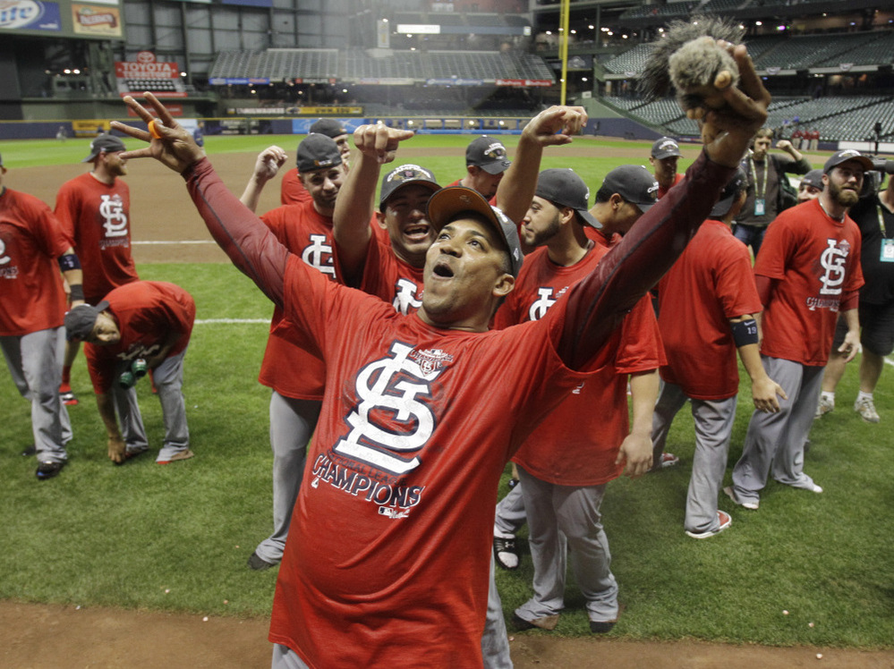 The Cardinals' 12-6 Sunday in Milwaukee set up a St. Louis-Texas matchup in the World Series. 