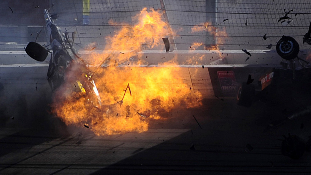 The car of driver Dan Wheldon  bursts into flames during the Las Vegas Indy 300. Wheldon, 33, was killed.