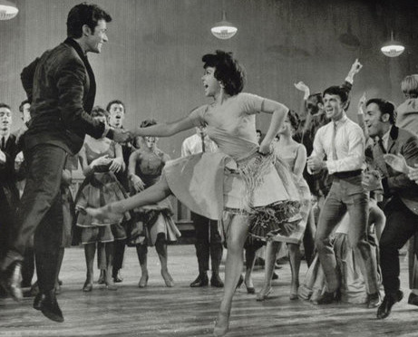 <p>George Chakiris (left) and Rita Moreno (center) play the couple Anita and Bernardo in 1961's <em>West Side Story.</em></p>