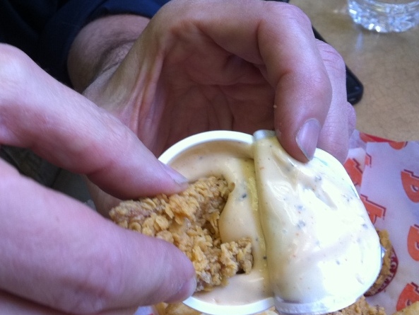 Dipping Dip'n Chick'n Chicken in Dip. 