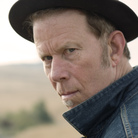 "Bad As Me" continues in Tom Waits' tradition of romanticizing figures on the fringes of society. "Bad As Me" continues in Tom Waits' tradition of romanticizing figures on the fringes of society.