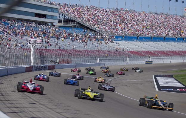 Drivers take five tribute laps in honor of Dan Wheldon, who died following a crash in the IndyCar Series Las Vegas Indy 300 auto race earlier Sunday. The race did not resume. 