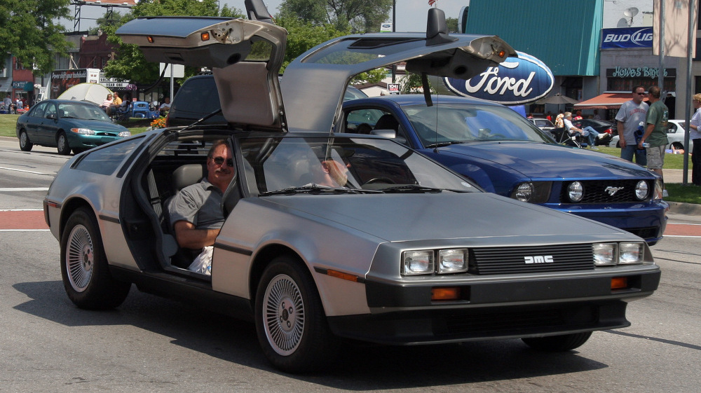 A 1981 DeLorean is seen in a commemorative cruise in Michigan. A Texas company plans to make electric versions of the iconic car.