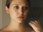 Elizabeth Olsen (left) plays Martha — or is she Marcy? May or Marlene? — a strained and strange young woman who has fled a cult's rural commune to take refuge with her sister (Sarah Paulson). Elizabeth Olsen (left) plays Martha — or is she Marcy? May or Marlene? — a strained and strange young woman who has fled a cult's rural commune to take refuge with her sister (Sarah Paulson).