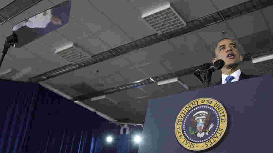 When he addresses crowds, the president often uses a teleprompter (screen at left) and a podium adorned with the presidential seal. Here: an Aug. 5, 2011, event at the Washington Navy Yard.