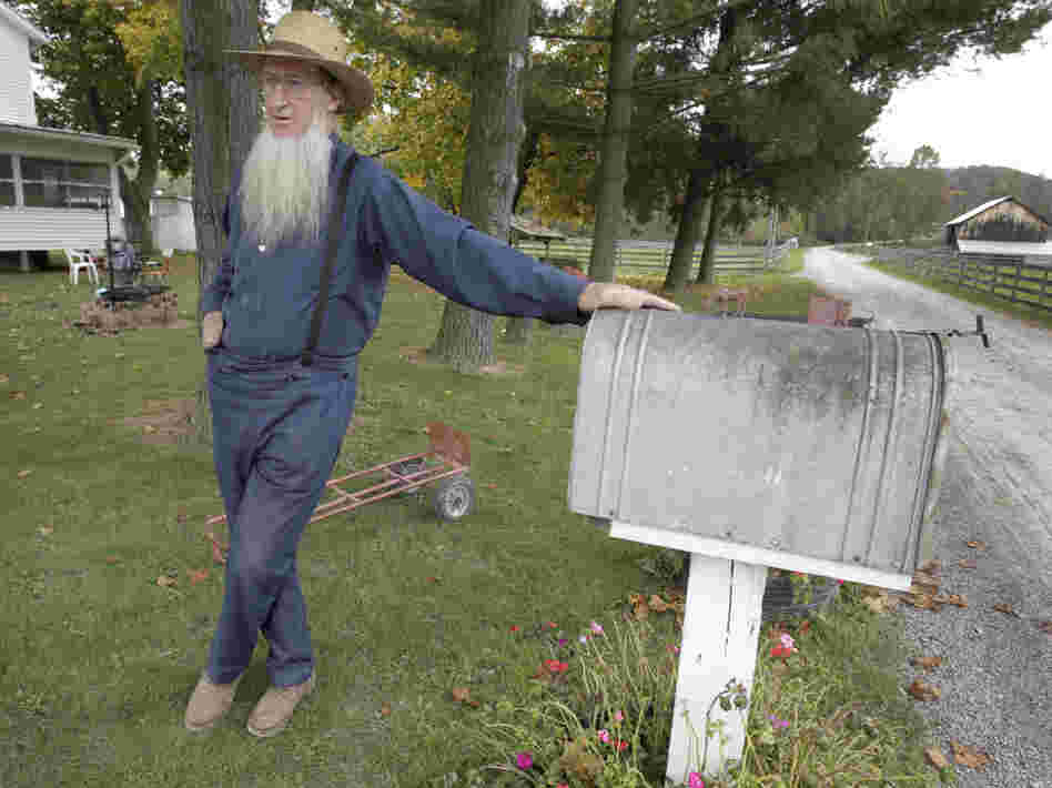 Sam Mullet, father of two of the three men arrested for allegedly going into the home of other Amish and cutting their hair and beards, is seen outside his home in Bergholz, Ohio. Some who have left Mullet's community have accused him of abuse. Sam Mullet, father of two of the three men arrested for allegedly going into the home of other Amish and cutting their hair and beards, is seen outside his home in Bergholz, Ohio. Some who have left Mullet's community have accused him of abuse.
