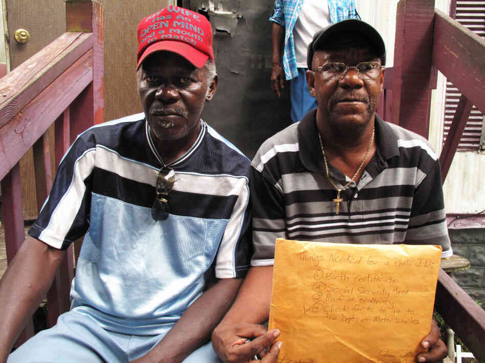 Sharecropper Willie Blair (left) of Sumter, S.C., has used that name all his life, and it was on his Social Security card. But his birth certificate says "Willie Lee McCoy." Blair never went to school and is illiterate. His cousin Raymond Evans (right) tried to help him get an ID so Blair could vote; but Evans says it was a frustrating process.