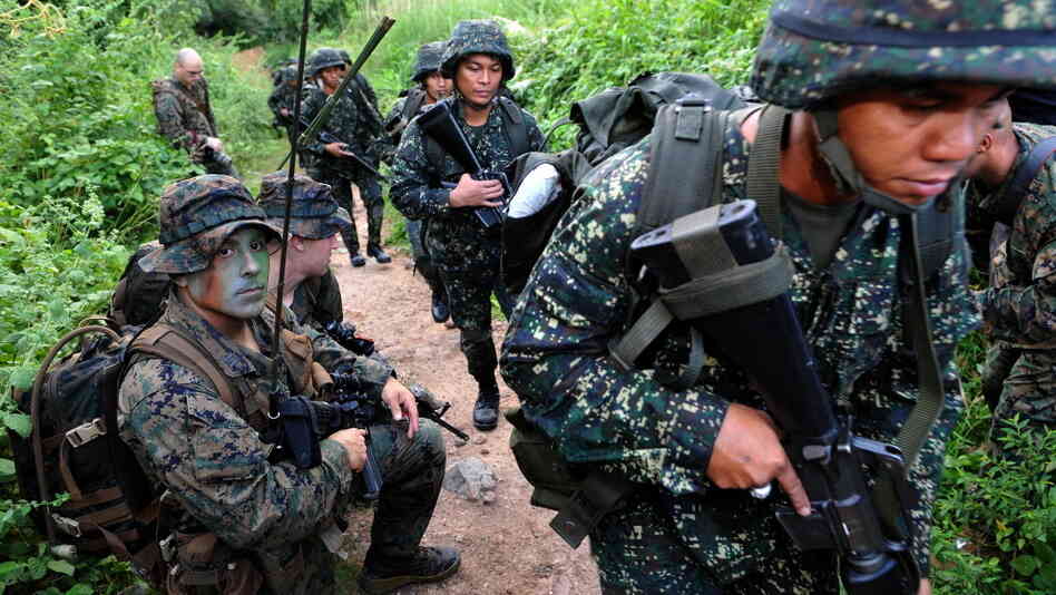 U.S. Marines and their Filipino counterparts take part in a training exercise last year in the Philippines. The U.S. has a history of sending small military contingents abroad. U.S. Marines and their Filipino counterparts take part in a training exercise last year in the Philippines. The U.S. has a history of sending small military contingents abroad.