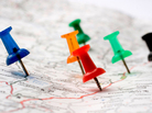 Thumbtacks on a map. Thumbtacks on a map.