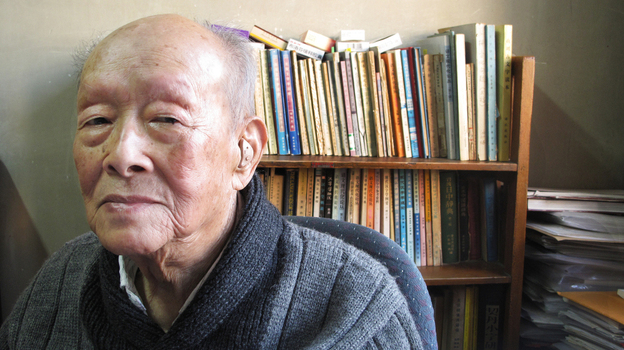 Zhou Youguang, founder of the Pinyin system of romanizing the Chinese language, has published 10 books since turning 100, some reflecting his critical views of the Chinese government. Shown here in his book-lined study, the outspoken Zhou has witnessed a century of change in China.