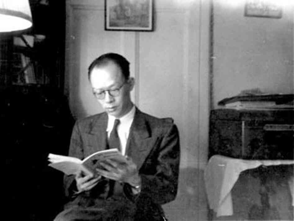 Zhou (shown here in New York in 1947) worked on Wall Street as a banker but returned to China in 1949 after the Communist Revolution. Zhou (shown here in New York in 1947) worked on Wall Street as a banker but returned to China in 1949 after the Communist Revolution.