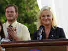 Amy Poehler, seen here with Aubrey Plaza as April Ludgate and Chris Pratt as Andy Dwyer, plays idealistic bureaucrat Leslie Knope on NBC's Parks And Recreation.