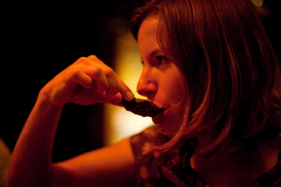 Your humble correspondent slurps an oyster at midnight. Your humble correspondent slurps an oyster at midnight.