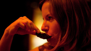 Your humble correspondent slurps an oyster at midnight.