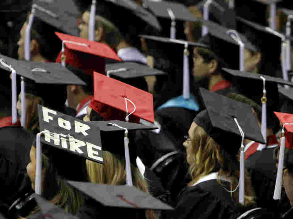 Students attend graduation ceremonies at the University of Alabama in Tuscaloosa, Ala. Two-thirds of college students now graduate with debt, owing an average amount of $24,000. Students attend graduation ceremonies at the University of Alabama in Tuscaloosa, Ala. Two-thirds of college students now graduate with debt, owing an average amount of $24,000.