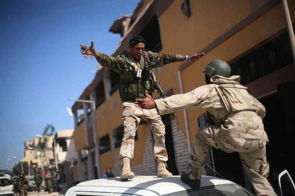 Officials in Libya's transitional government said Moammar Gadhafi was captured and killed Thursday when revolutionary forces overwhelmed Sirte. 
