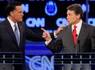 Former Massachusetts Gov. Mitt Romney (left) and Texas Gov. Rick Perry got into a heated exchange about immigration during Tuesday's GOP presidential debate in Las Vegas. Former Massachusetts Gov. Mitt Romney (left) and Texas Gov. Rick Perry got into a heated exchange about immigration during Tuesday's GOP presidential debate in Las Vegas.