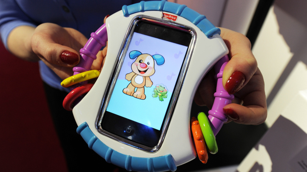  For real: Fisher-Price's Laugh & Learn Baby iCan Play Case protects an iPhone while baby plays with apps. 