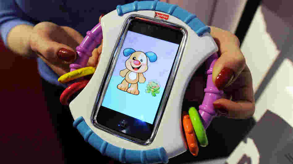  For real: Fisher-Price's Laugh & Learn Baby iCan Play Case protects an iPhone while baby plays with apps. 