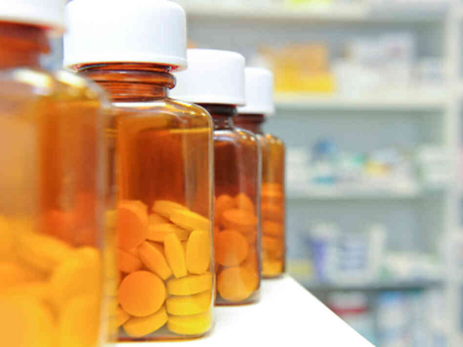 A row of pill bottles A row of pill bottles
