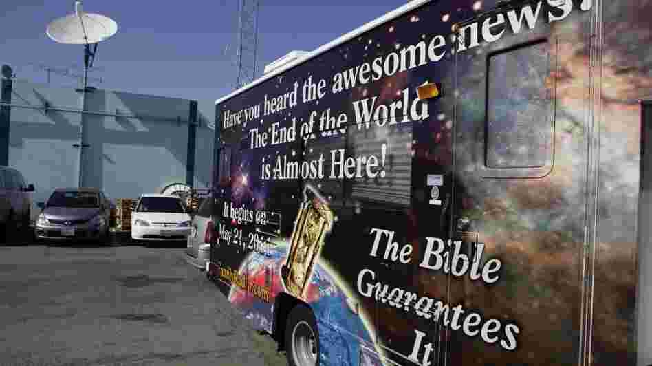 A sign on an RV announces the end of the world, outside Harold Camping's ministry in Oakland, Calif., Monday, May 23, 2011. Ahead of that day, many of Camping's followers had quit their jobs or donated money to pay for more than 5,000 billboards and 20 RVs plastered with the Judgment Day message.