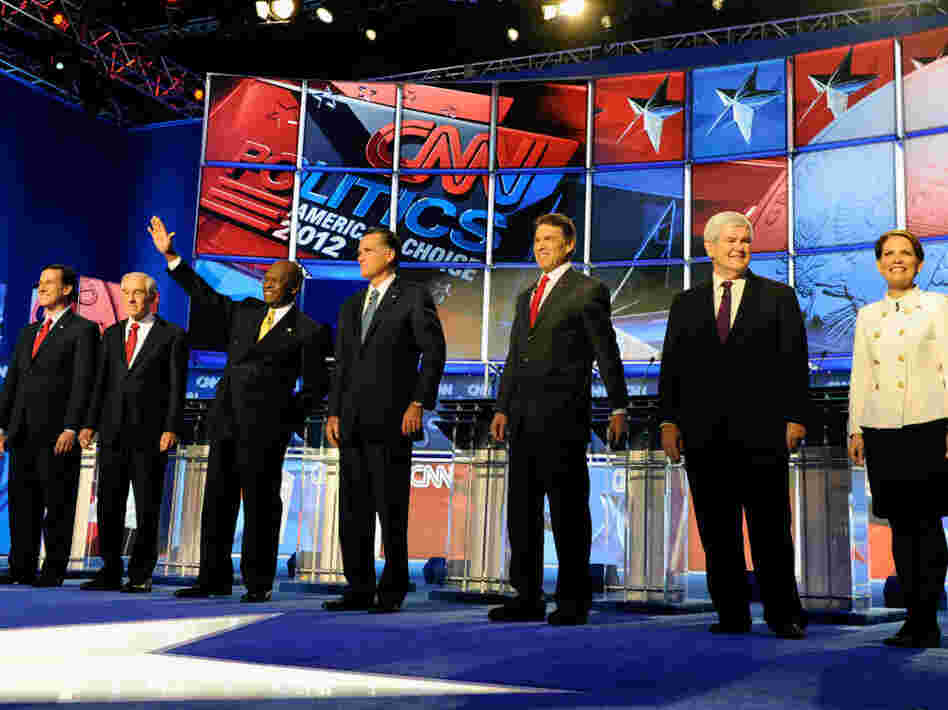 Former U.S. Sen. Rick Santorum, U.S. Rep. Ron Paul, businessman Herman Cain, former Massachusetts Gov. Mitt Romney, Texas Gov. Rick Perry, Former House Speaker Newt Gingrich and U.S. Rep. Michele Bachmann participate in a Republican presidential debate last week in Las Vegas.