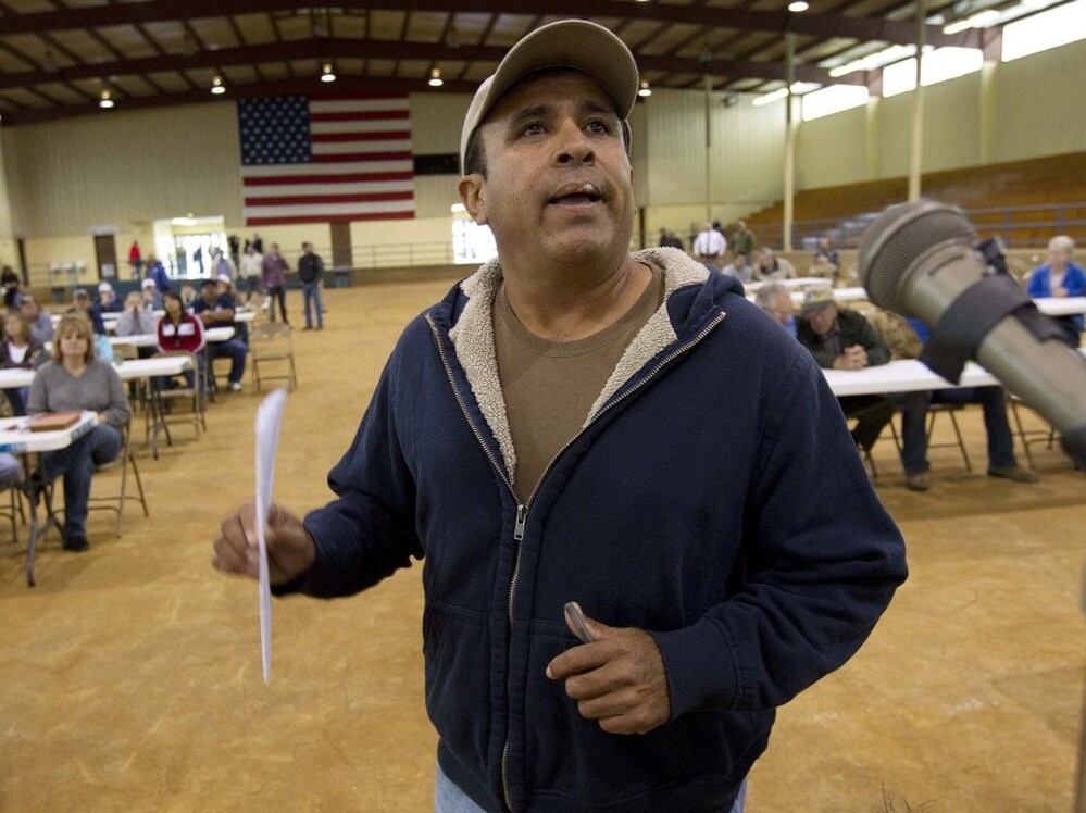 Migrant worker Felipe Chacoa of Mexico talks about his desire to continue to harvest produce during a meeting of farmers and state officials to discuss the impact of the Alabama Immigration law on their livelihoods in Oneonta, Ala.