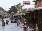 Residents make their way along flooded streets on the outskirts of Bangkok on Saturday. Thailand is experiencing the worst flooding in 50 years. Residents make their way along flooded streets on the outskirts of Bangkok on Saturday. Thailand is experiencing the worst flooding in 50 years.