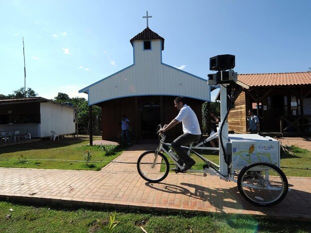 A Google team member rides a Trike with a 360-degree camera system on it to record the "Street View for the Amazon" in Tumbira in August. Google says the images will be ready in a few weeks. 