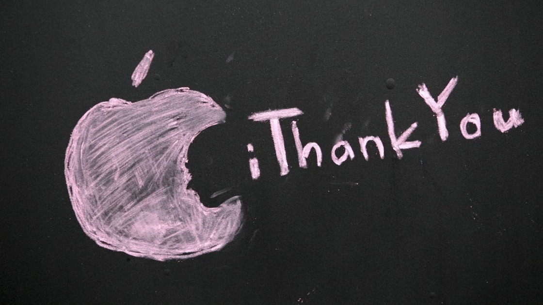 A message honoring Steve Jobs is scrawled on a blacked-out window at an Apple store in Seattle.